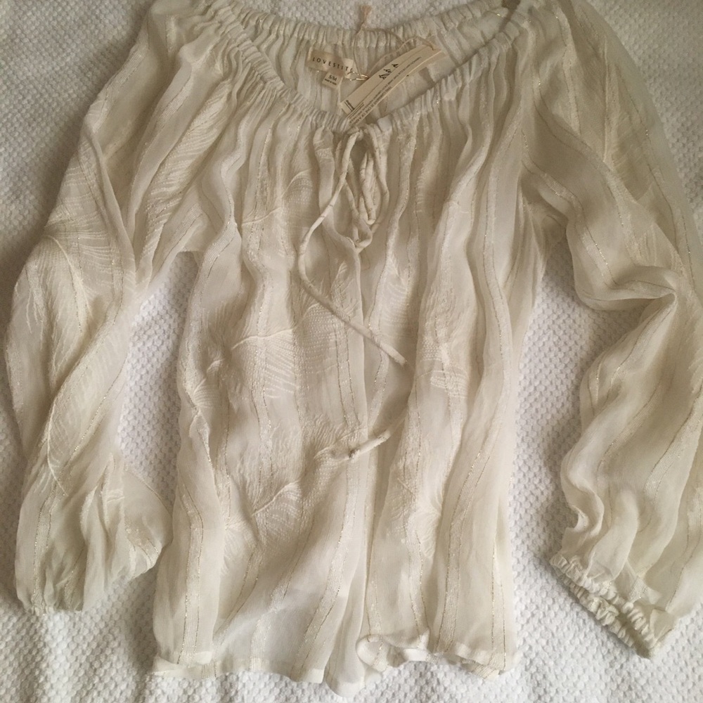 Women’s blouse; cream S/M